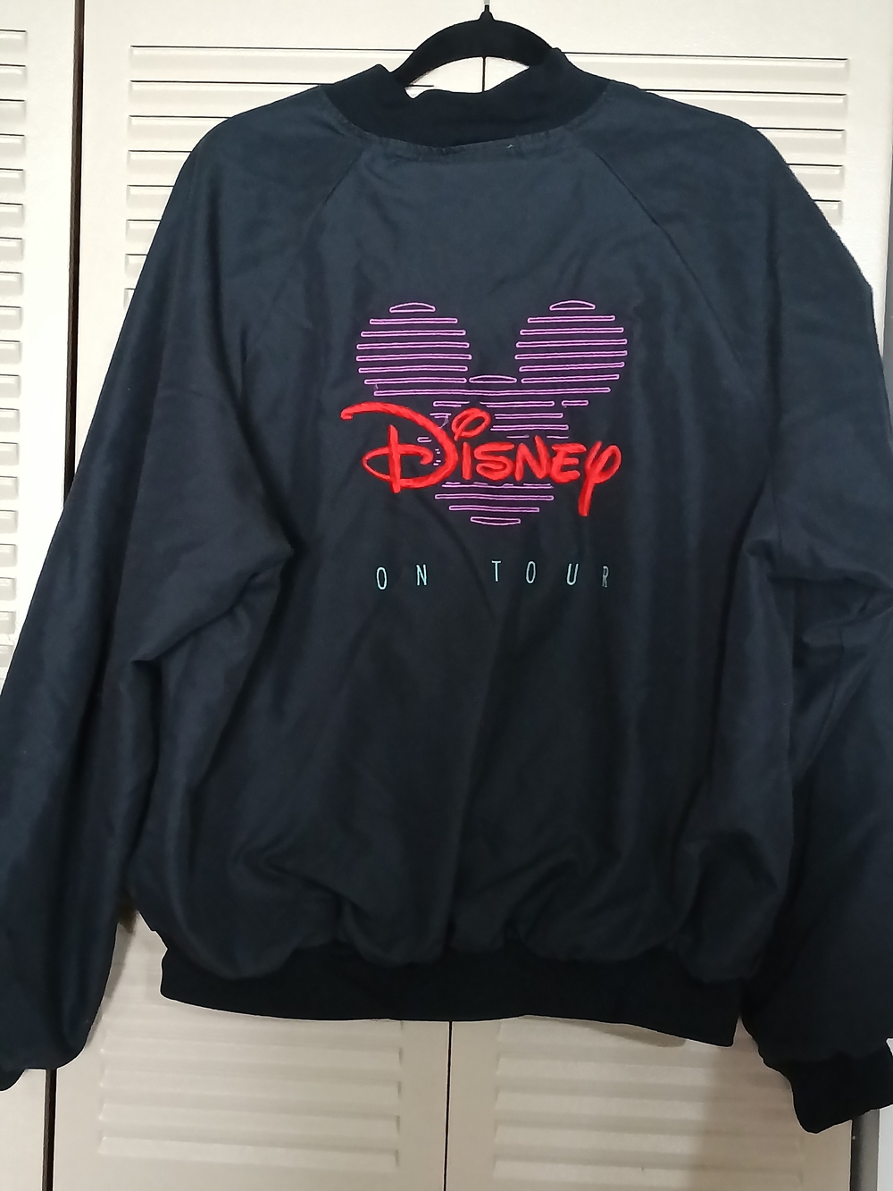 Disney 'On Tour' Black Jacket with Neon Heart Logo